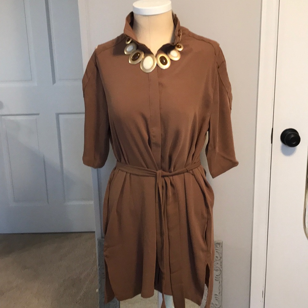 Chico’s 2 is a size 12 cold shoulder shirt.